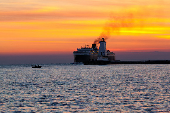 Badger Passing Ludington Lighthouse