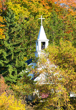 Church Steeple against Autumn Colored Background