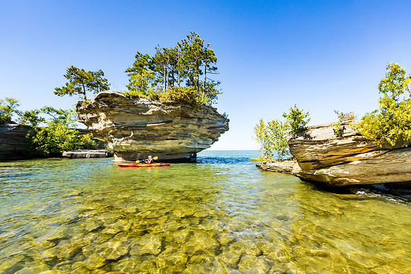 Woman Kayaks Turnip Rock