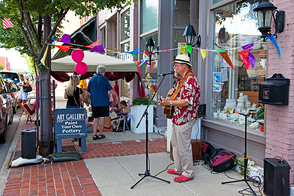 Musician performs during 1st Thursdays Art Walk